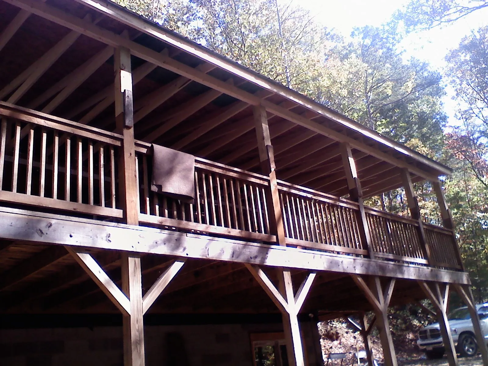 Timber framing under a new elevated porch and deck — Roof Leak Repair in Prattsburgh by Roofing Brothers